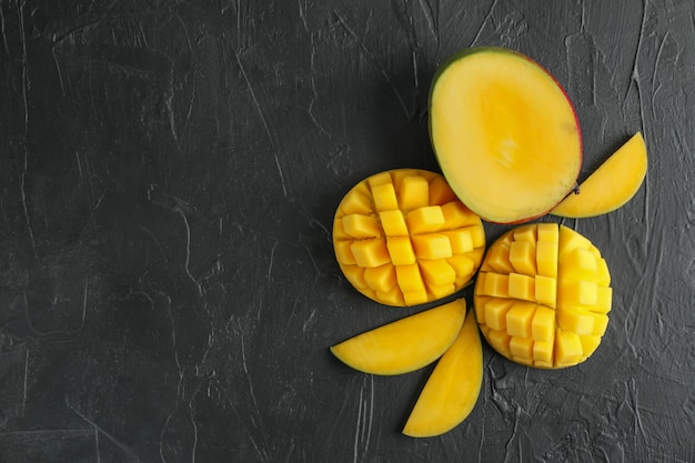 Flat lay composition with cut mangoes