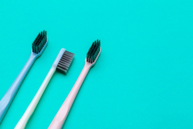 Flat lay composition with manual toothbrushes, close up