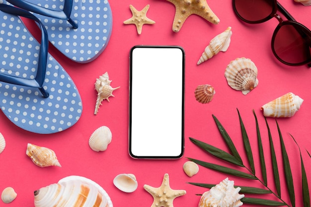 Flat lay composition with Phone and beach accessories on colored background Smartphone with blank screen mock up with copy space