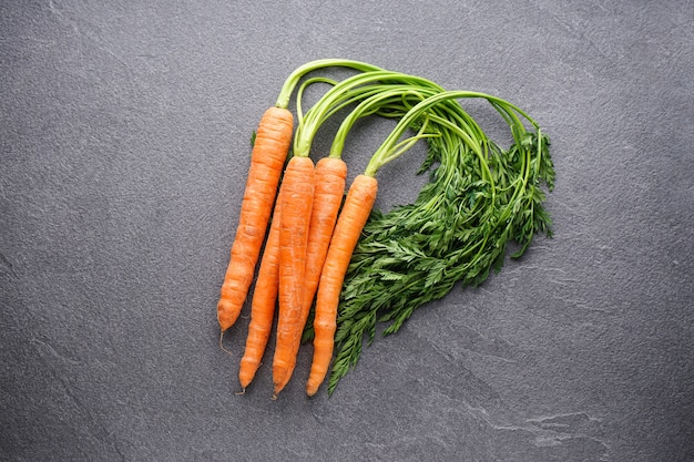 Flat lay composition with ripe fresh carrots