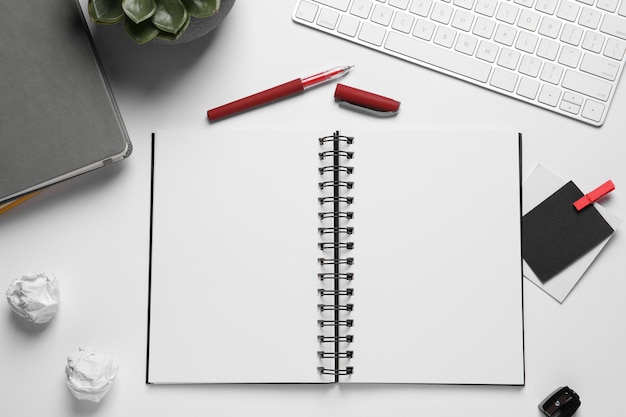 flat lay composition with stylish notebooks on white table