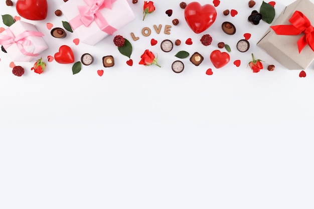 Flat lay composition with Valentine day accessories on white background