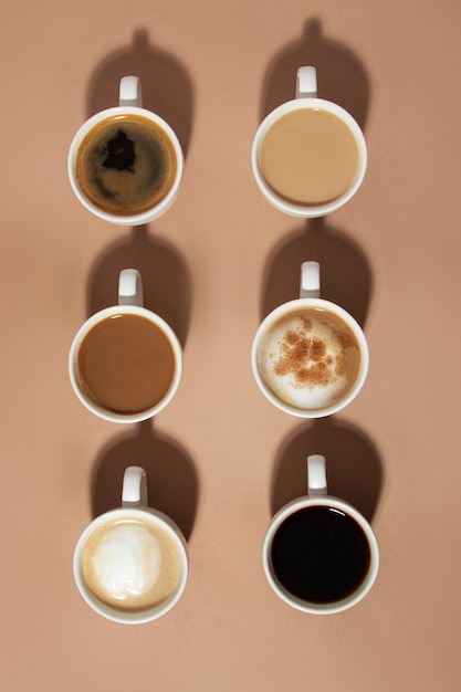 Photo flat lay delicious coffee cups arrangement