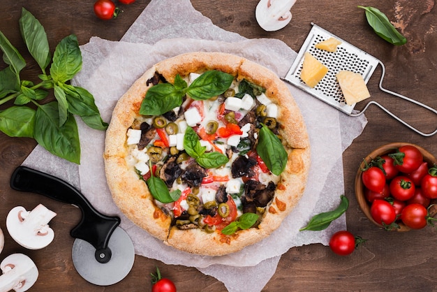 Photo flat lay delicious pizza and vegetables