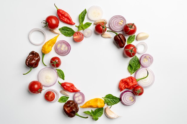 Flat lay design of vegetable, herb and spice on white background.