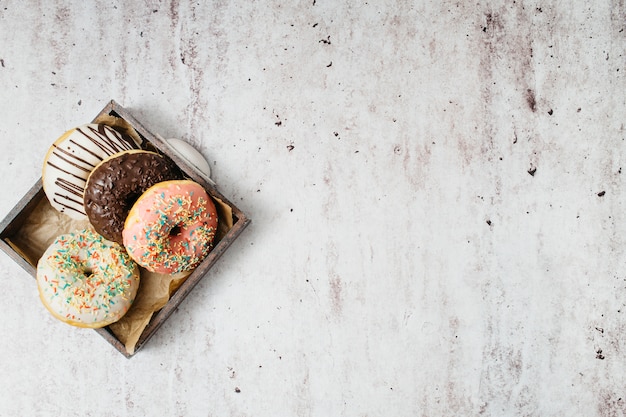 Photo flat lay donut composition with copyspace