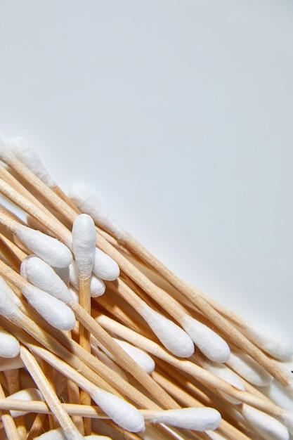 Flat lay eco-friendly cotton swabs, bamboo cotton buds