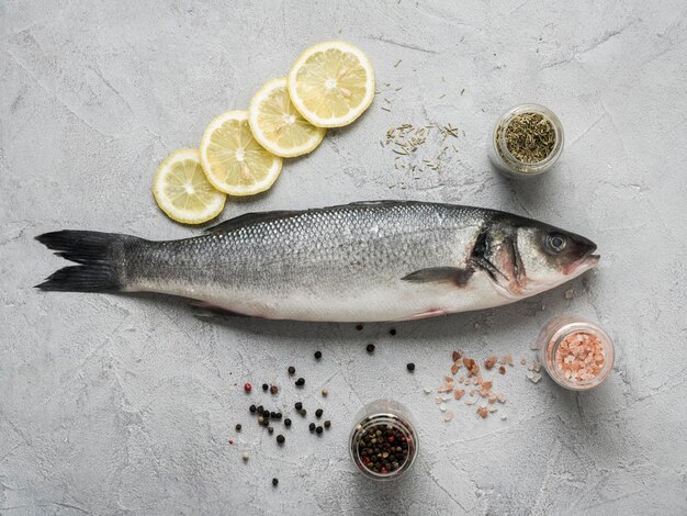 flat lay fish lemon spices