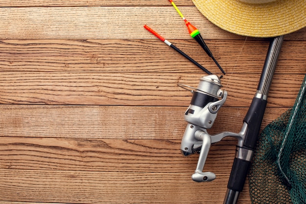 Photo flat lay of fishing essentials with copy space