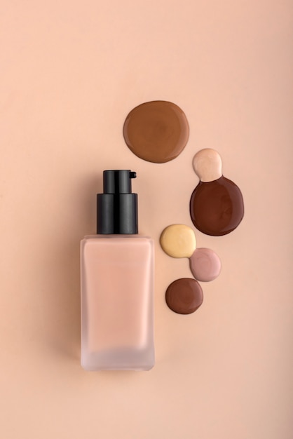 Photo flat lay foundation bottle advertising