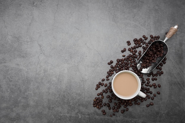 Flat lay frame with coffee cup and beans