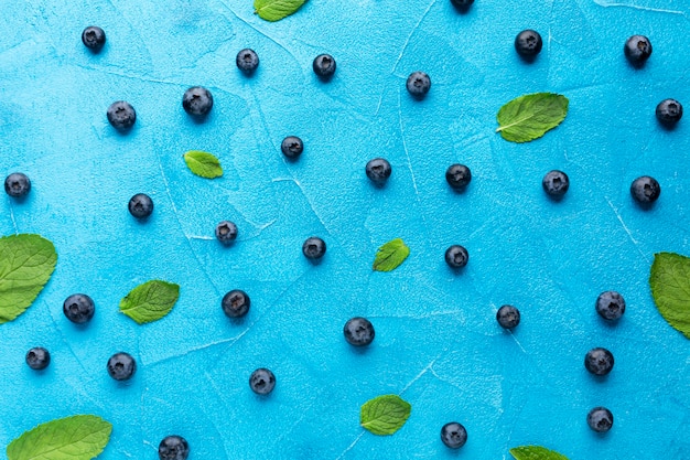 Flat-lay of fresh currants and leaves