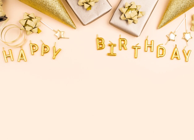 Photo flat lay golden birthday decorations frame