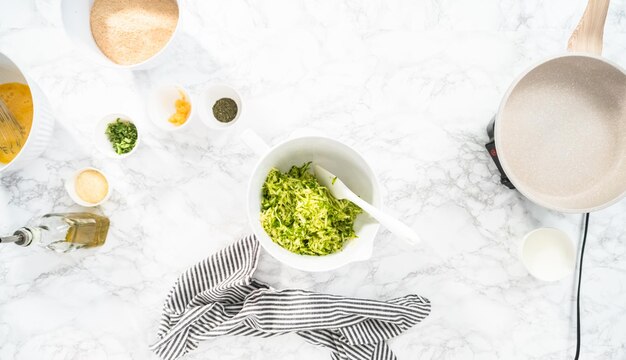 Flat lay. Grading organic zucchini to make zucchini cakes.