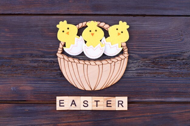 Flat lay hatched cartoon chicks. Easter surprise concept.