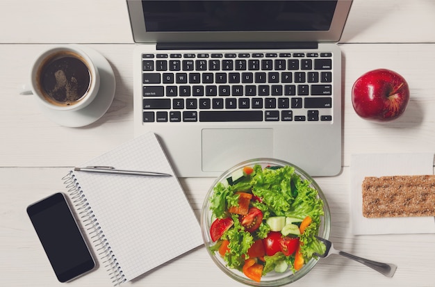 Flat lay of healthy business lunch snack in office