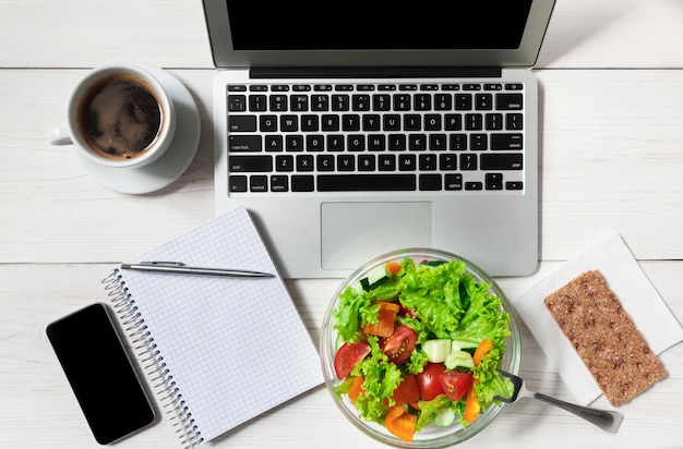 Flat lay of healthy business lunch snack in office