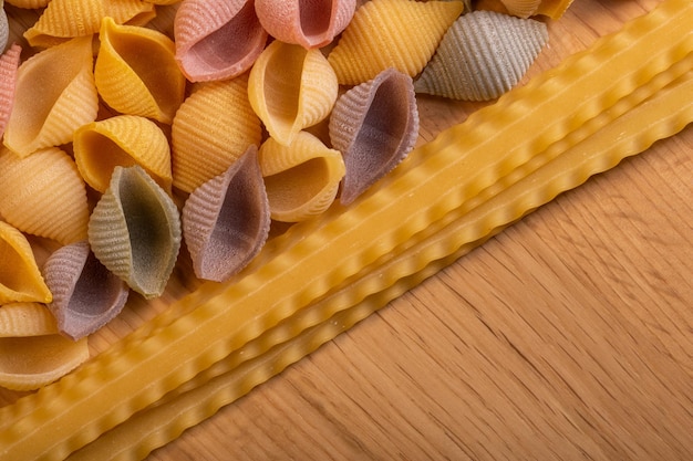 Flat lay image of varius tipe of pasta and spagetti for backgrounds and wall art