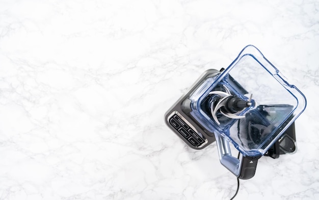 Flat lay. Ingredients for making crepes on a marble countertop.