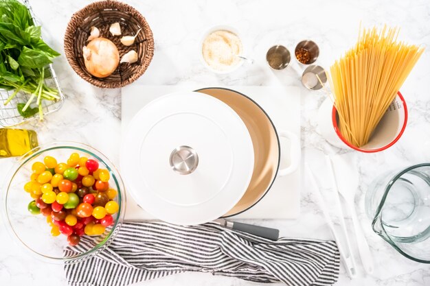 Photo flat lay. ingredients to prepare vegetarian one pot pasta.