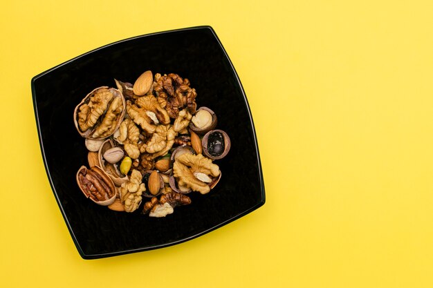 Flat lay ketogenic diet A mix of walnutpistachiospecanalmond