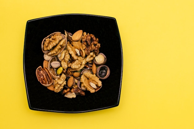 Flat lay ketogenic diet A mix of walnutpistachiospecanalmond