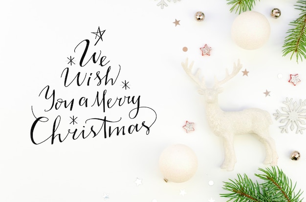 Flat lay lettering We Wish You a Merry Christmas sign text