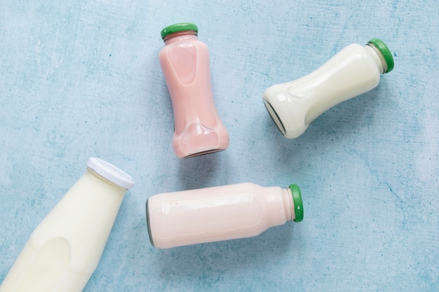 Photo flat lay milk bottles arrangement