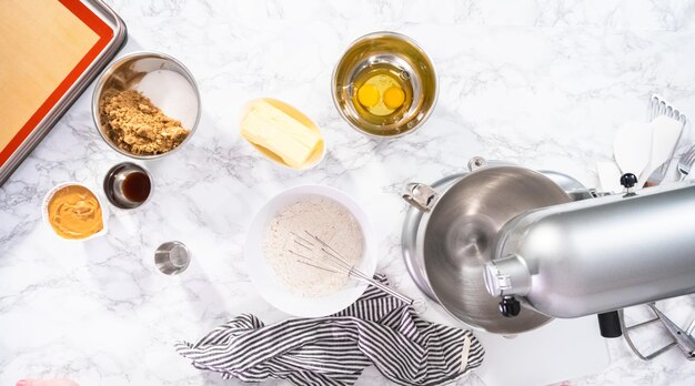 Flat lay. Mixing ingredients to bake peanut butter cookies.