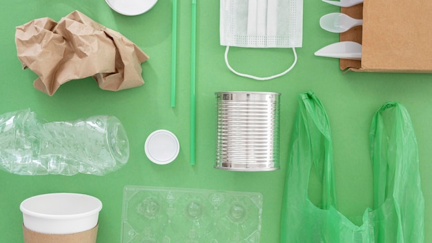 Flat lay non eco friendly plastic elements composition