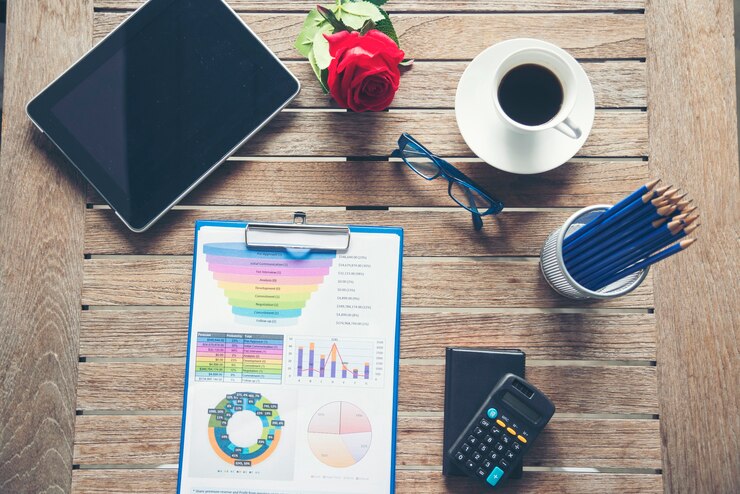 Photo flat lay notebook computer laptop on office desk. no people business graph chart mockup on business