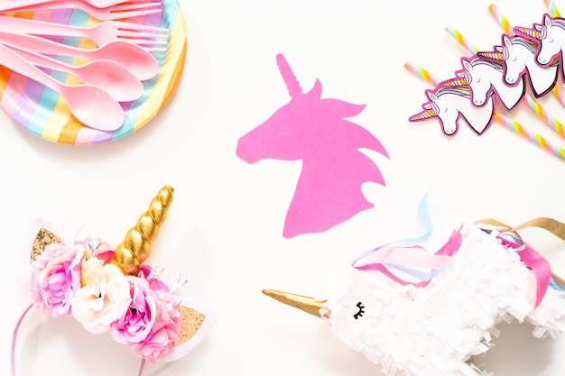 Flat lay. Objects for unicorn themed kids birthday party.