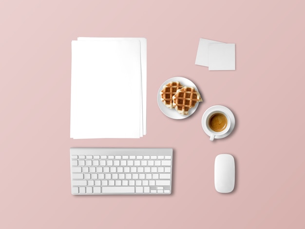 Flat lay office desk items in concept of working with coffee and pancakes.