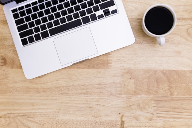 Flat lay Office desk table of modern workplace with laptop on wooden table, laptop background