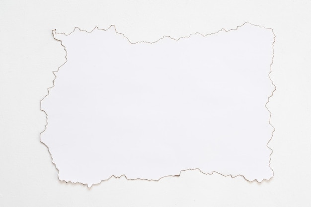Flat lay of paper mockup on white surface After fire contour Abstract background Copy space