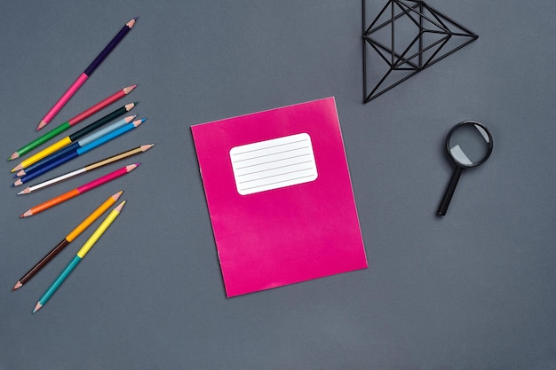 Flat lay photo of workspace desk with school accessories or office supplies