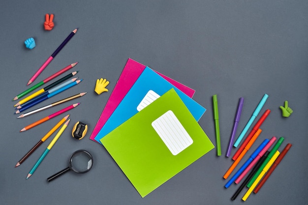 Flat lay photo of workspace desk with school accessories or office supplies