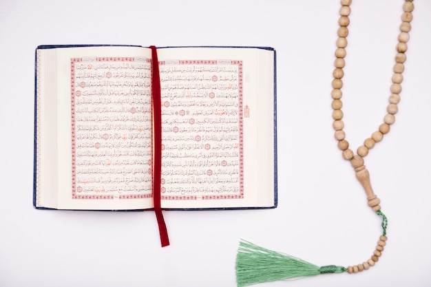 Flat lay quran opened on table