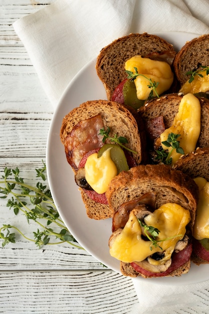 Photo flat lay of raclette dish with ingredients and delicious food