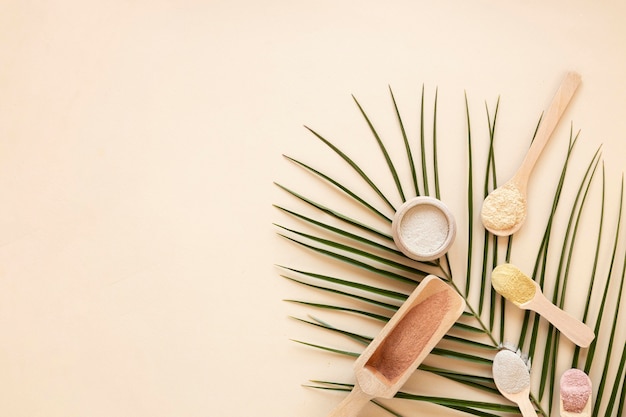 Photo flat lay sand and leaves