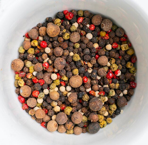 Flat lay of simple collection of spice on the colorful surface, dry food