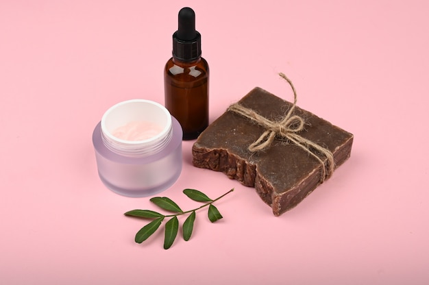 Flat lay skin care. Flat layout with accessories, spa cosmetics, bath salt, cream and towels. Skin care product, natural cosmetic, flat lay image.