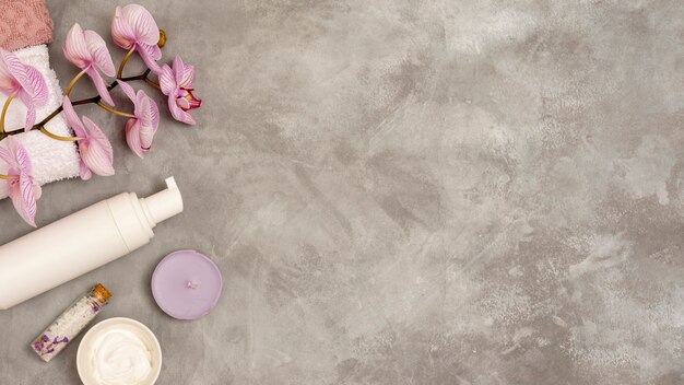 Flat lay spa frame on stucco background