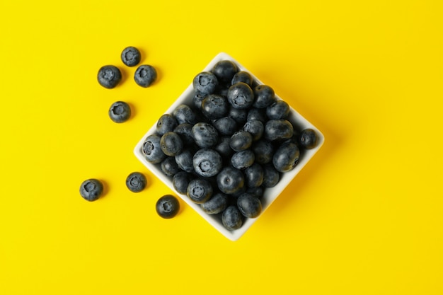 Flat lay of square bowl with blueberry