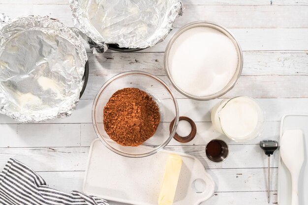 Flat lay. Step by step. Ingredients to make macadamia nut fudge.