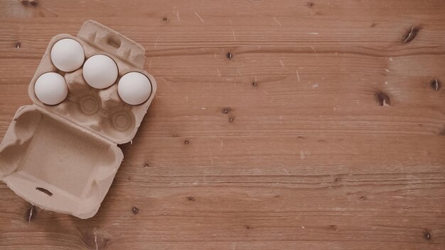 Flat lay. Step by step. white flour in a paper egg crate.