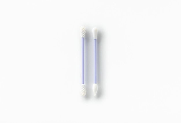 Flat lay top view reusable silicone swab buds on white background