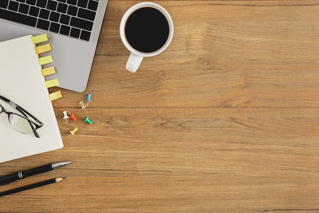 flat lay, top view wooden office desk workspace