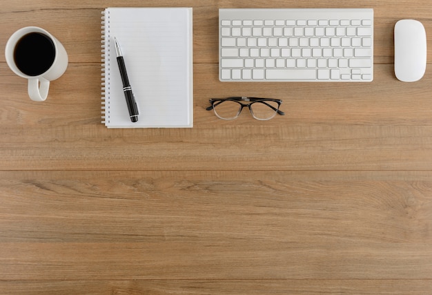 Flat lay, top view wooden office desk Workspace