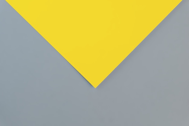 Flat lay in a trendy 2021 new colors. Illuminating Yellow and Ultimate Gray. Color of the Year 2021.